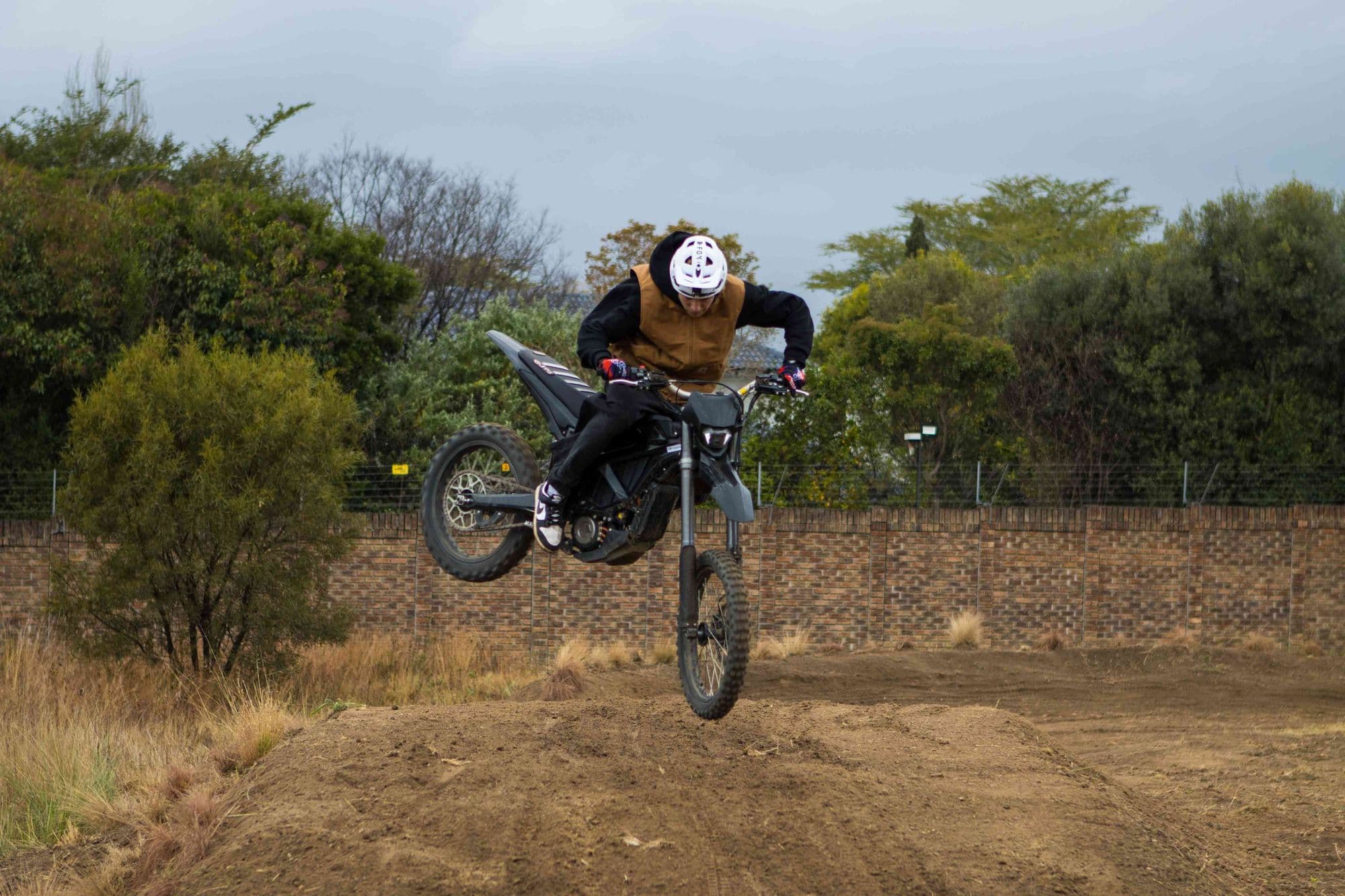 Rider scrubbing a jump