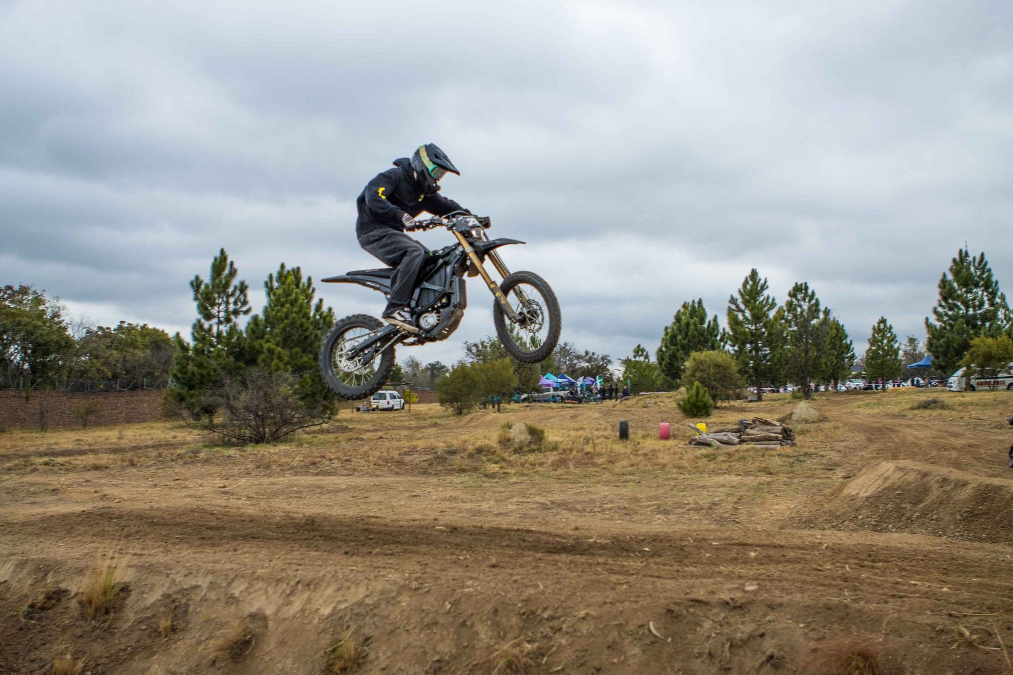 Rider jumping against the sky
