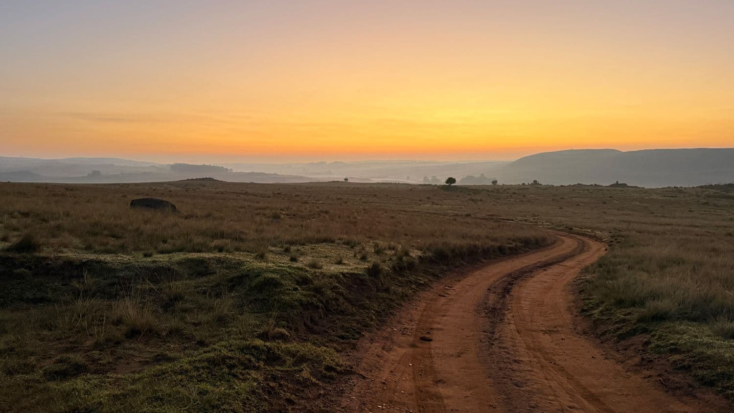 Sunset over a dirt track in Dullstroom